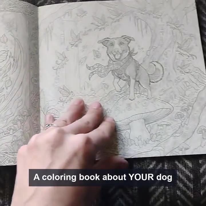 A real printed LumiLabs coloring book held in a hand